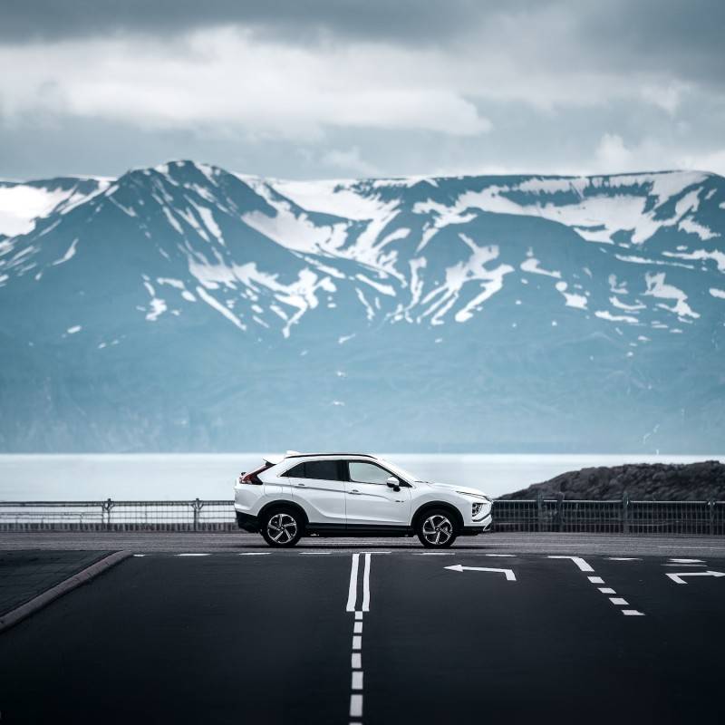 SUV parked on road in Iceland