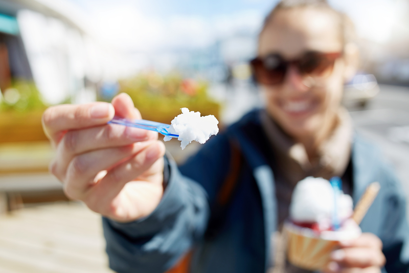 woman-eating-ice-cream-on-her-babymoon-in-iceland-reykjavik