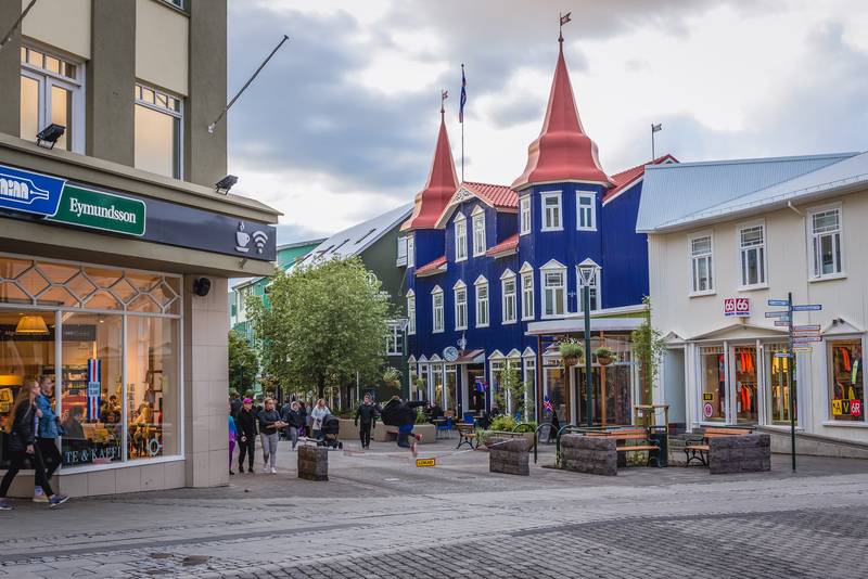 Parking-in-akureyri-seen-down-the-main-shopping-street-with-funny-looking-house