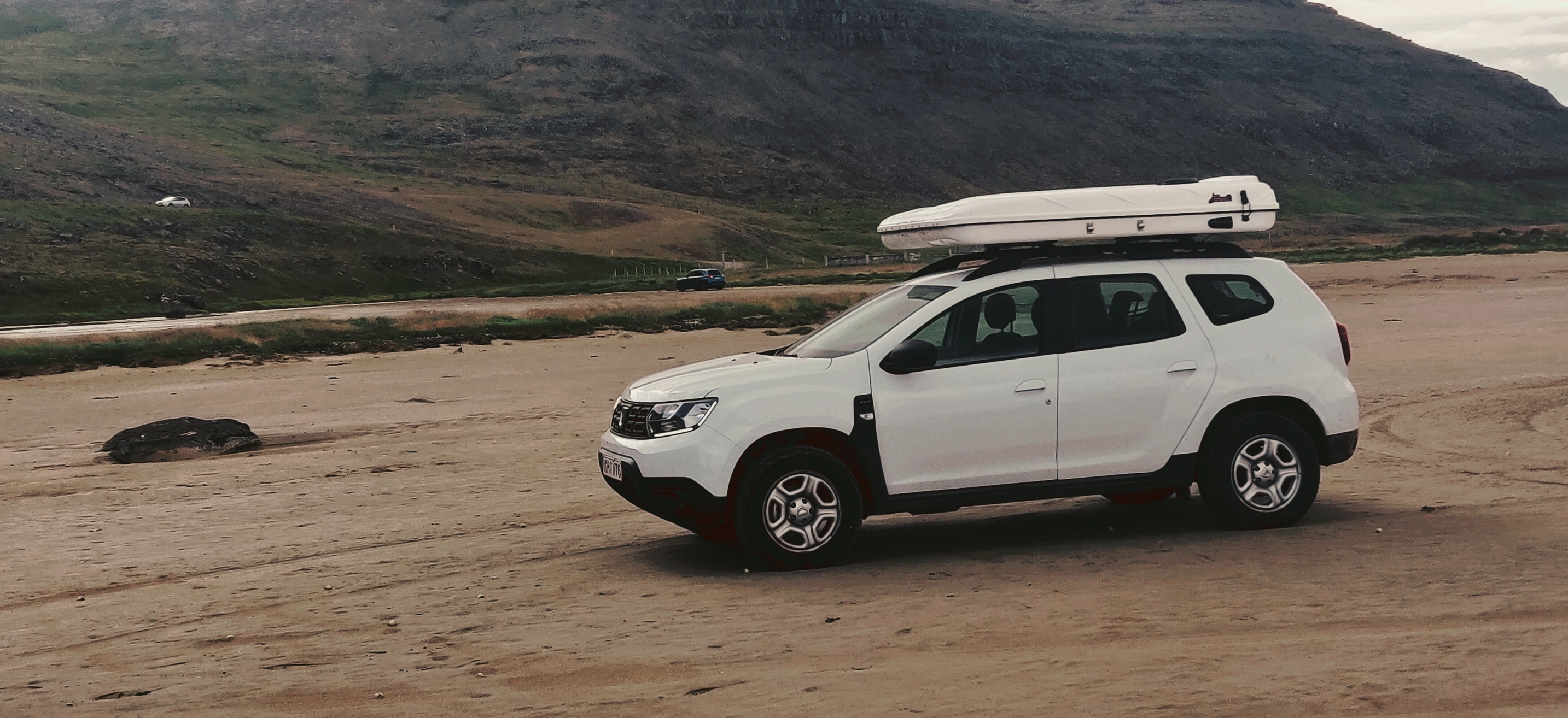 Dacia Duster with roof tent in wetfjords iceland