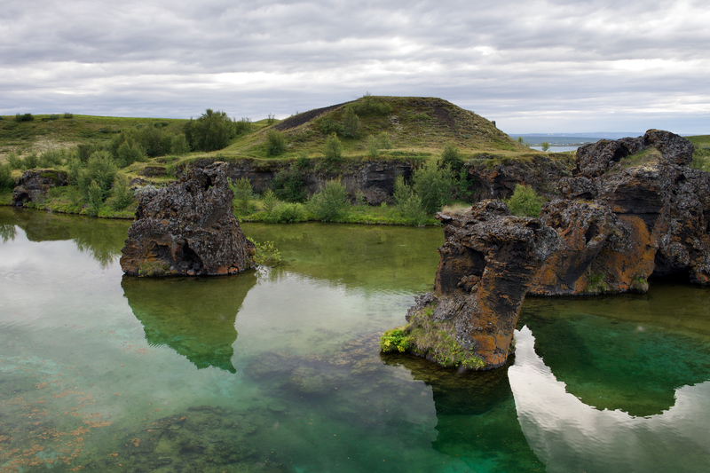 lake-myvatn-in-north-iceland-on-a-bright-summer-day-with-rock-formations-in-the-water