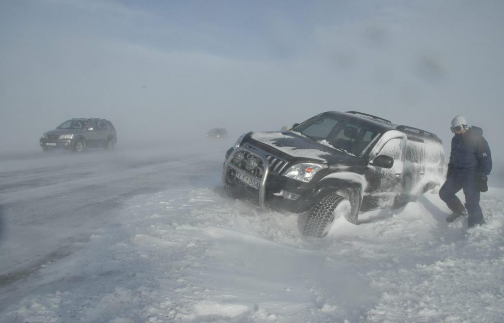 Car stuck in snow in Icelandic winter